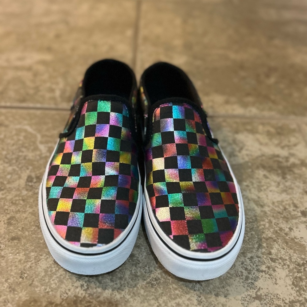 Women’s size 6 Vans. Slip on shoe with iridescent rainbow checkers.